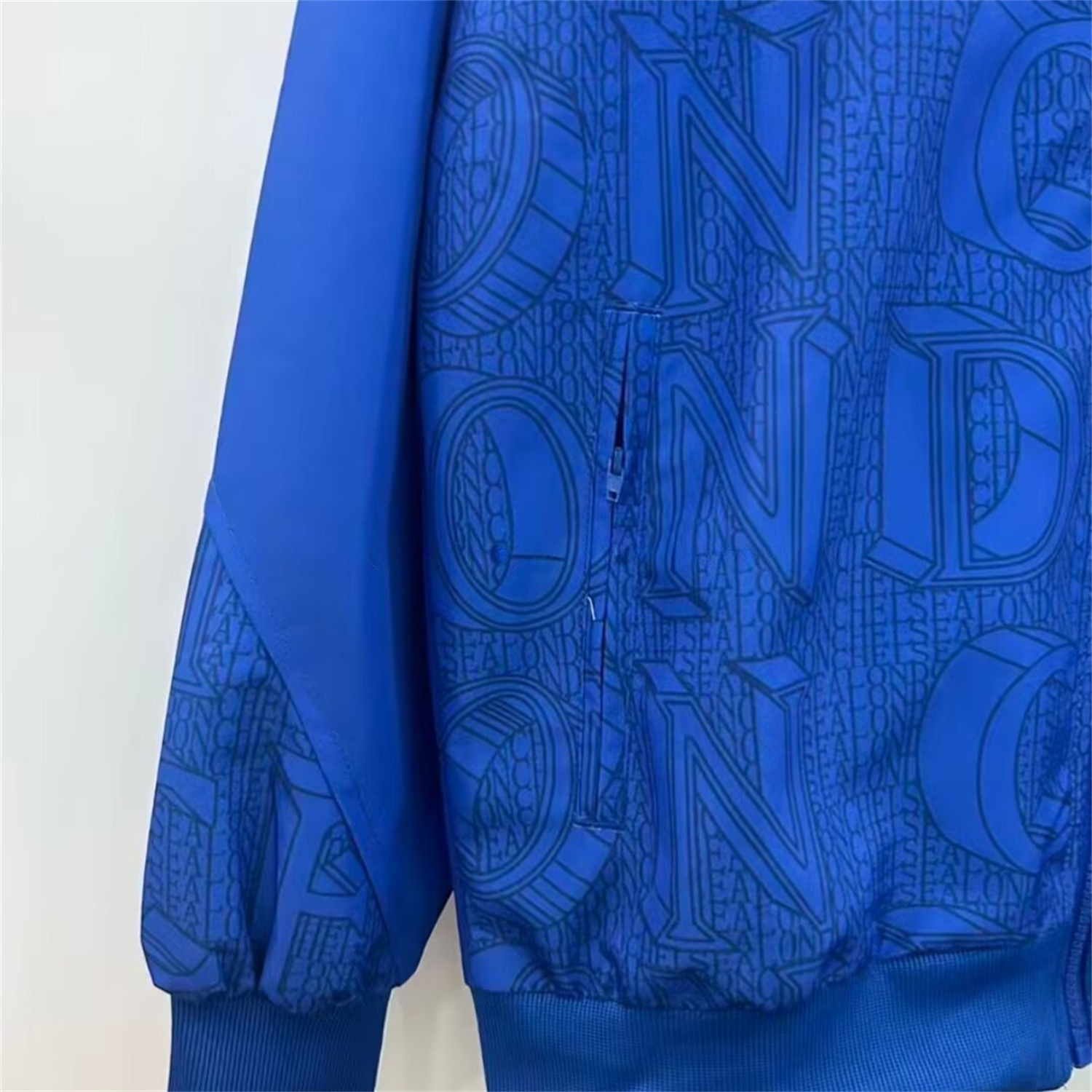 C.H.E.L.S.E.A 25-26 Subtle Letter Pattern Windbreaker Jacket - Blue - Unitedfutballjersey