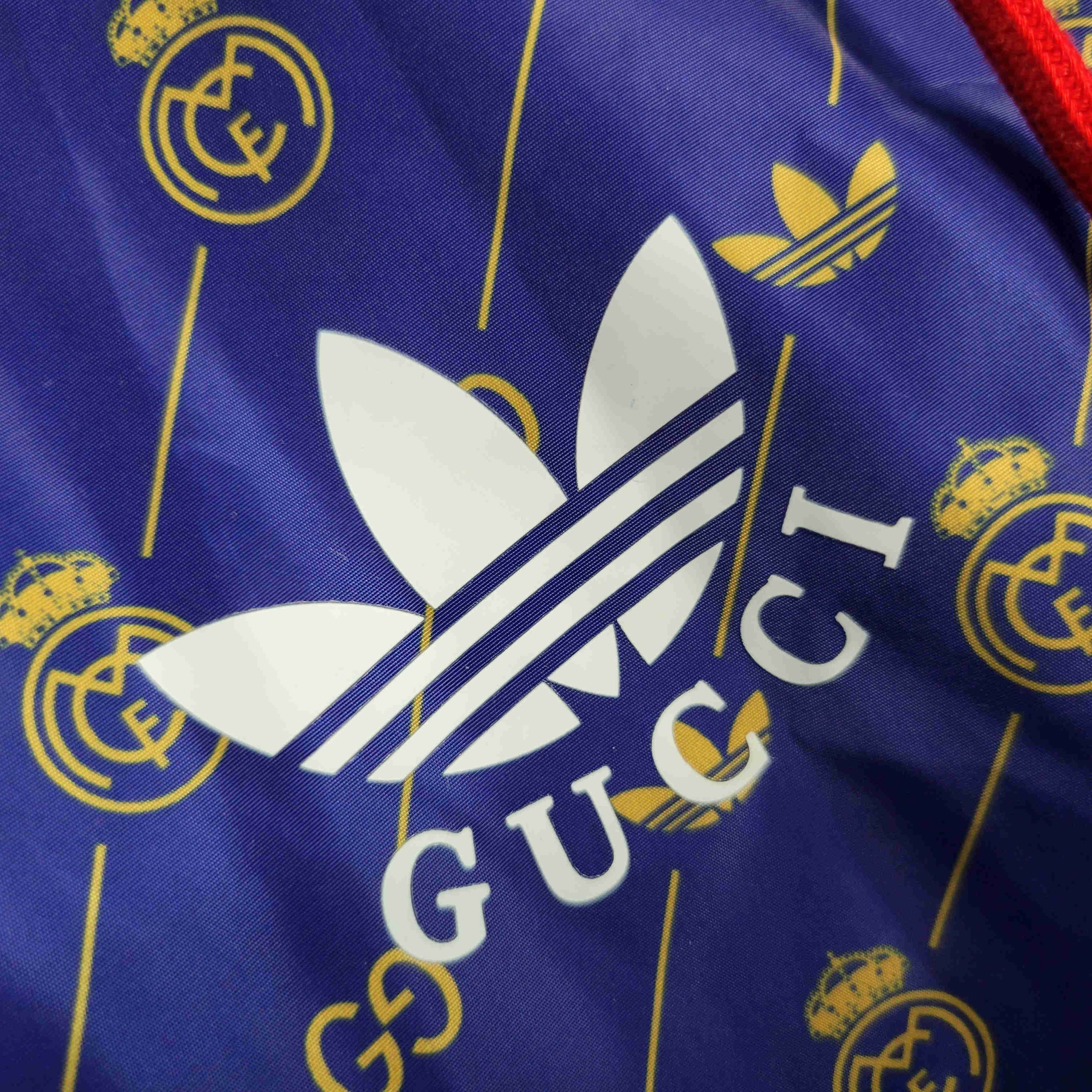 23-24 Real Madrid x GUCCI Navy Windbreaker - Unitedfutballjersey