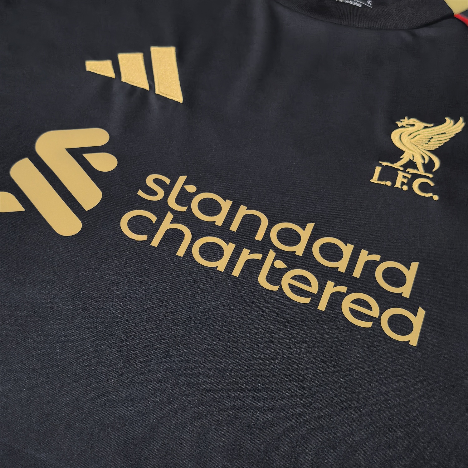 Liver.pool 25-26 Black Gold Special Jersey with Red Lines - Fans Version - Unitedfutballjersey